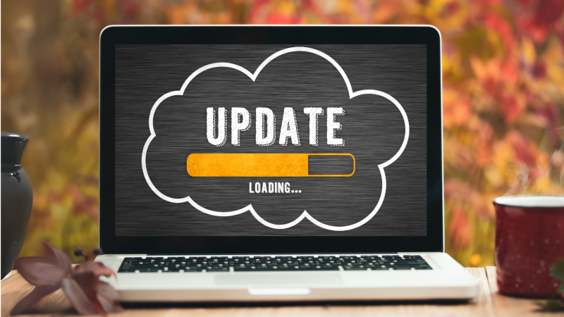 Photo of computer with the message update loading